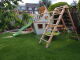 BIBEX® Play Tower - Wonder Cottage M120 + Slide, 2x Swings, Climbing Net, Climbing Stones, Furniture
